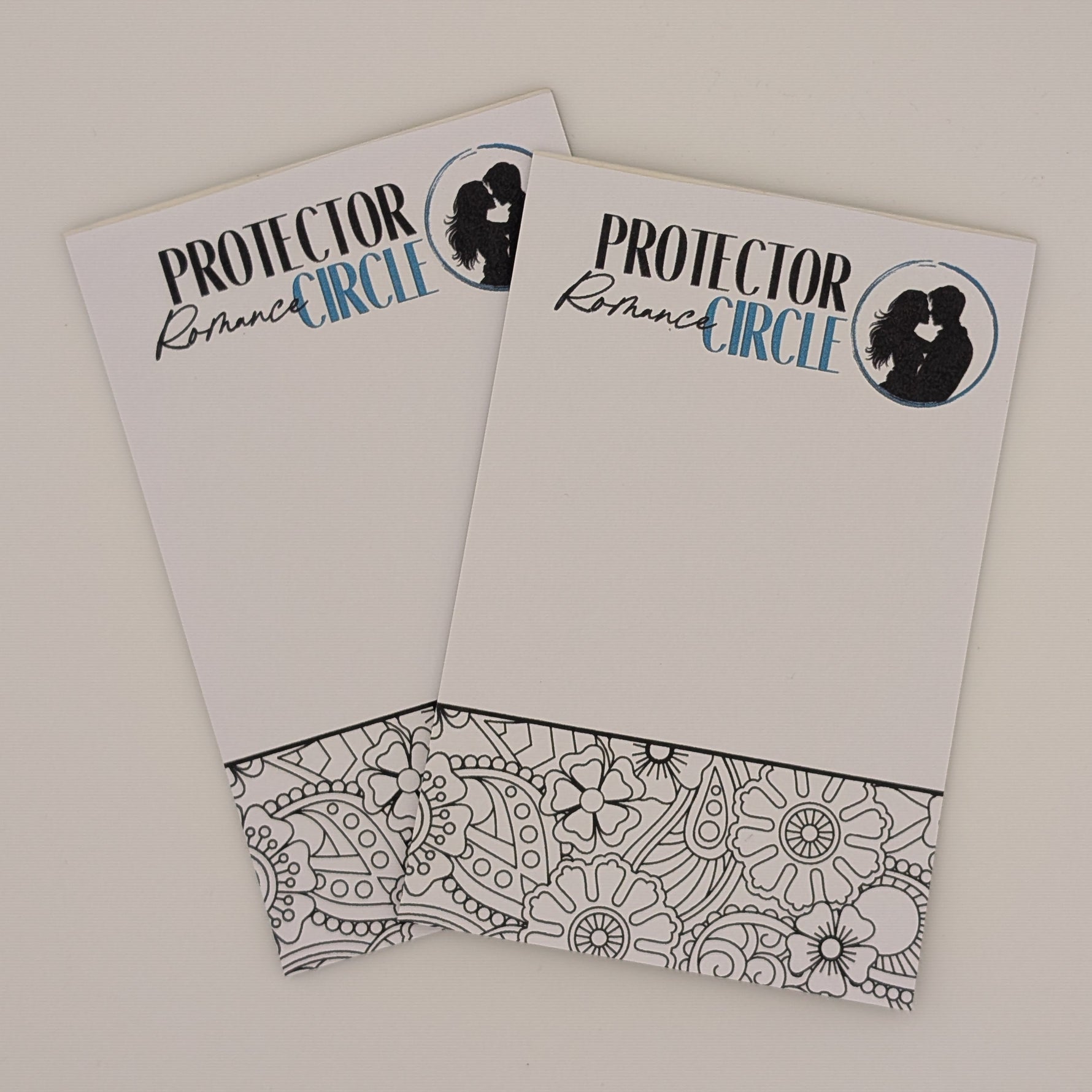Two notepads with 'Protector Circle' text and logo in the header position and a floral and paisley coloring section in the footer on a white background.