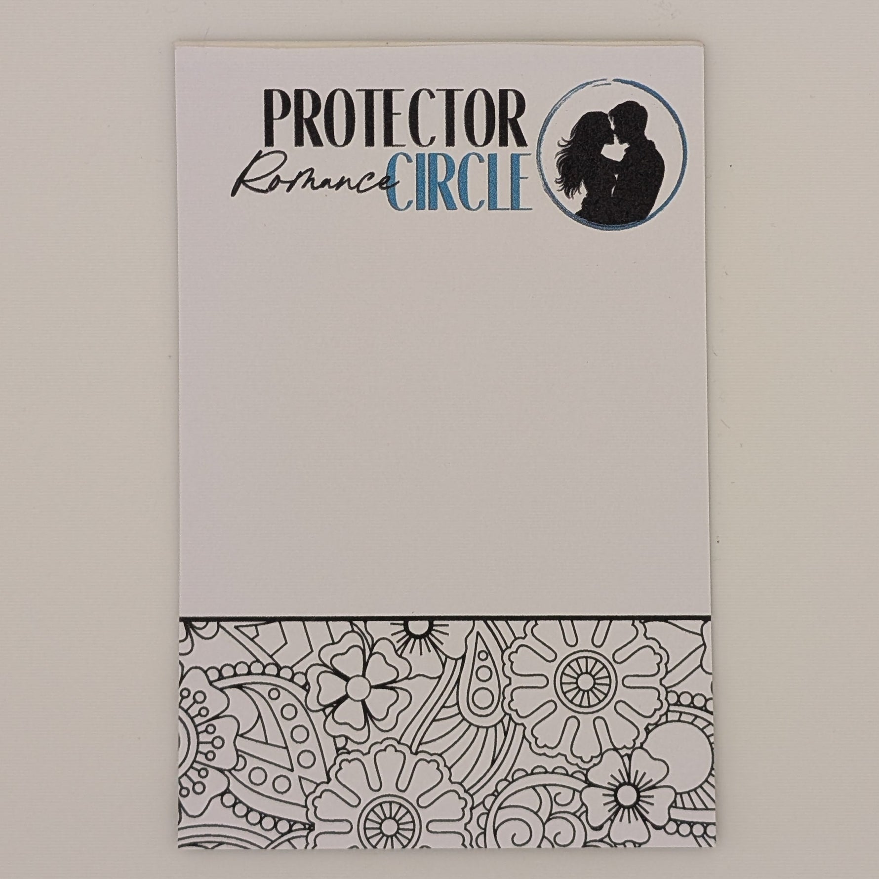 Notepad with 'Protector Circle' branding on a plain background with a coloring section at the bottom